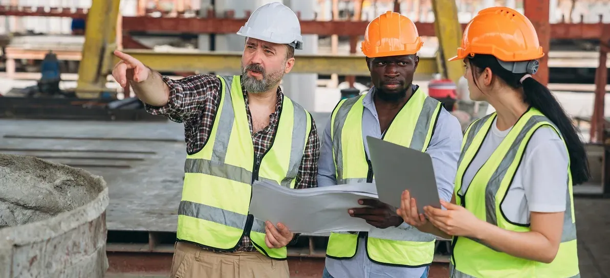 Engineer checking building strength and foundations, showing construction. Worker in construction site.
